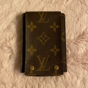 VINTAGE LOUIS VUITTON- Monogram Coated Canvas IPod Case, 2009. Never Used.